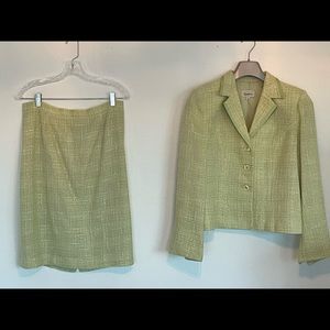 Beautiful women’s suit. Size 10. Made in Canada. Dry clean only. No pockets.